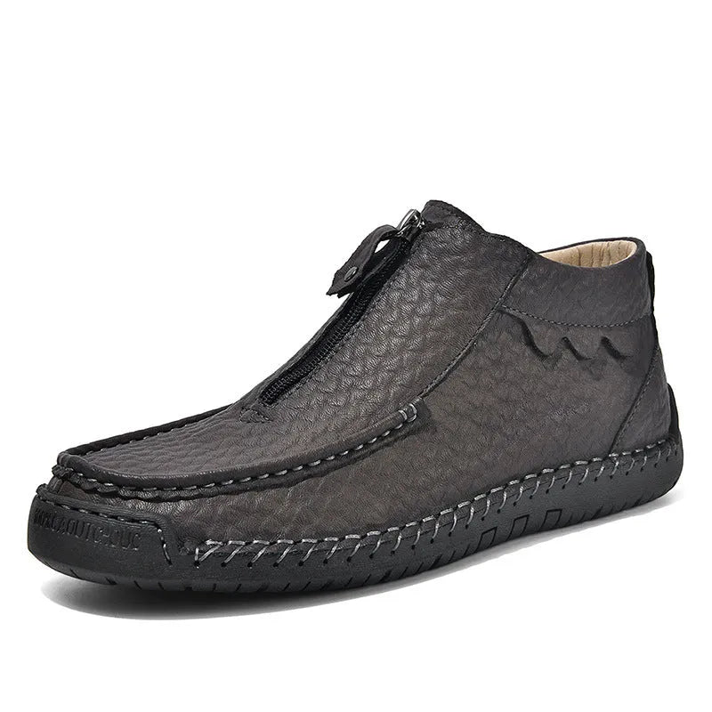 Men's slip-on leather loafers in black, brown, and grey colours showing round toe and rubber sole