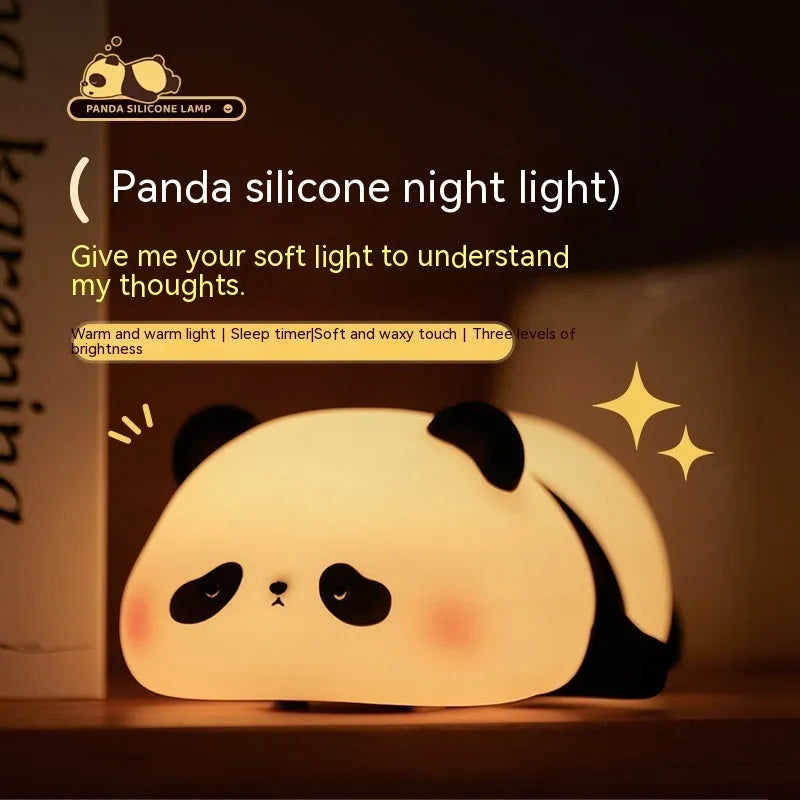 Cartoon panda-shaped night light with soft silicone construction and warm white LED glow