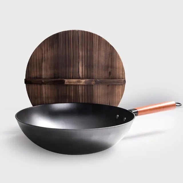 Traditional black iron wok with wooden handle showing 40cm diameter and flat induction base