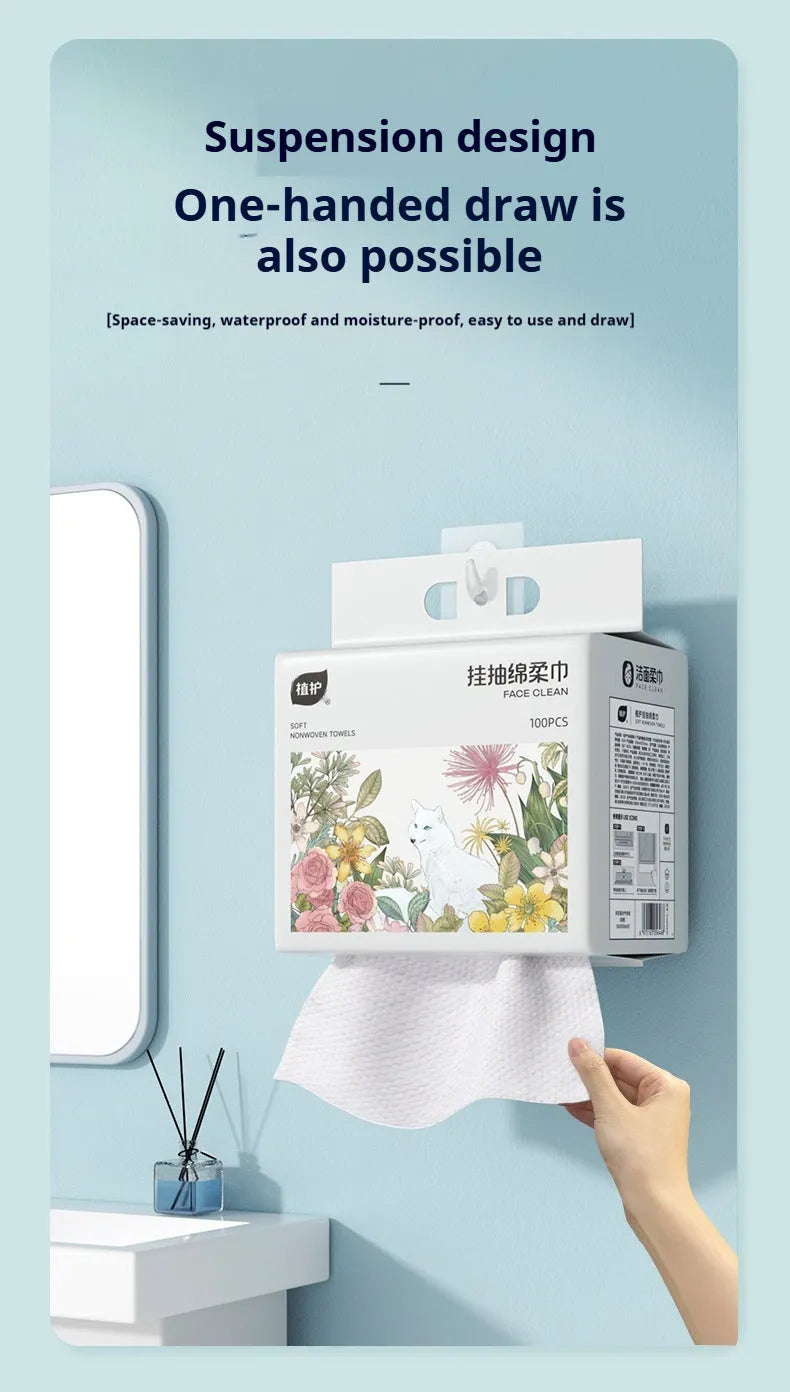 A roll of disposable soft white face cloths made from viscose and polyester blend.