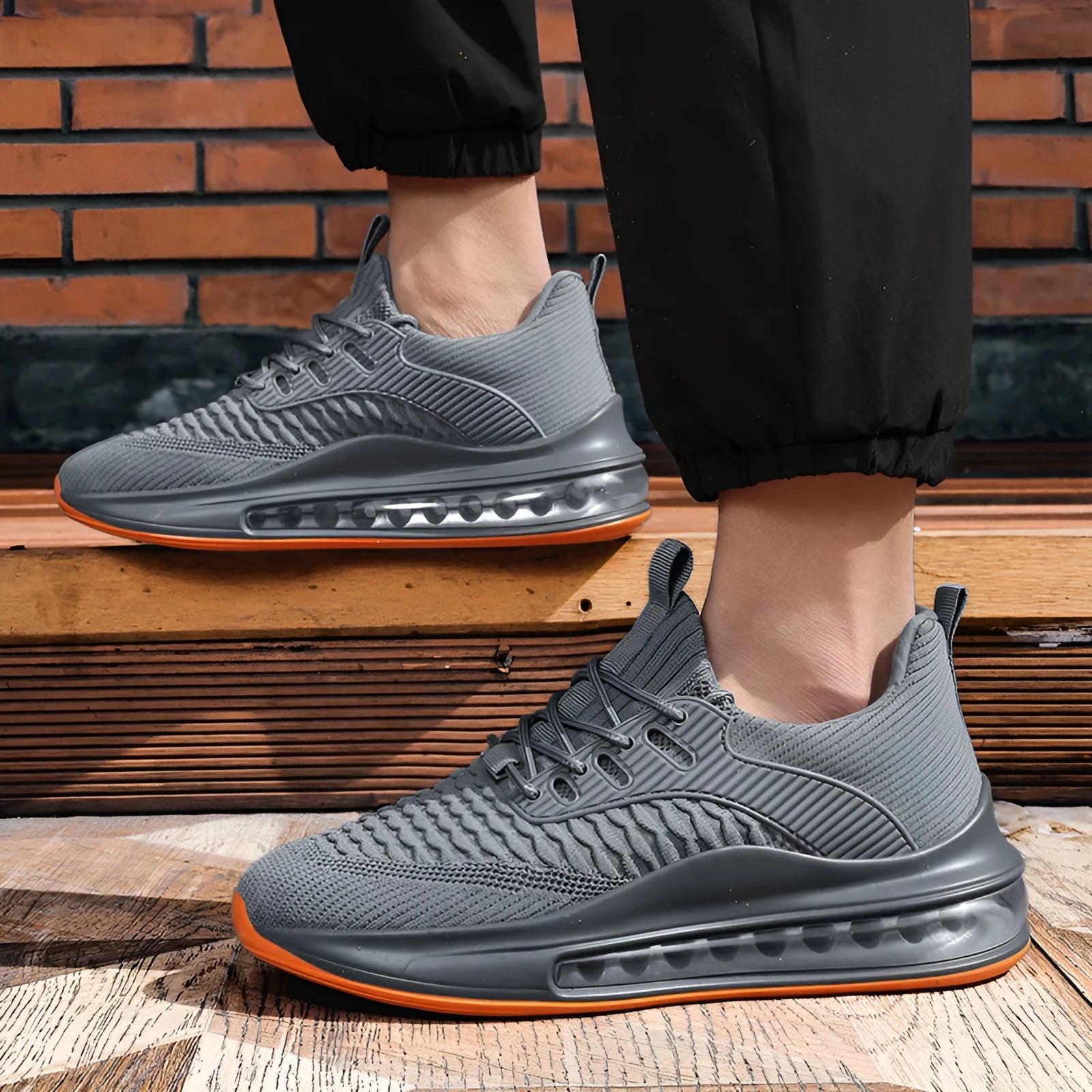Men's black low-top mesh running sneakers with lace-up front and platform sole