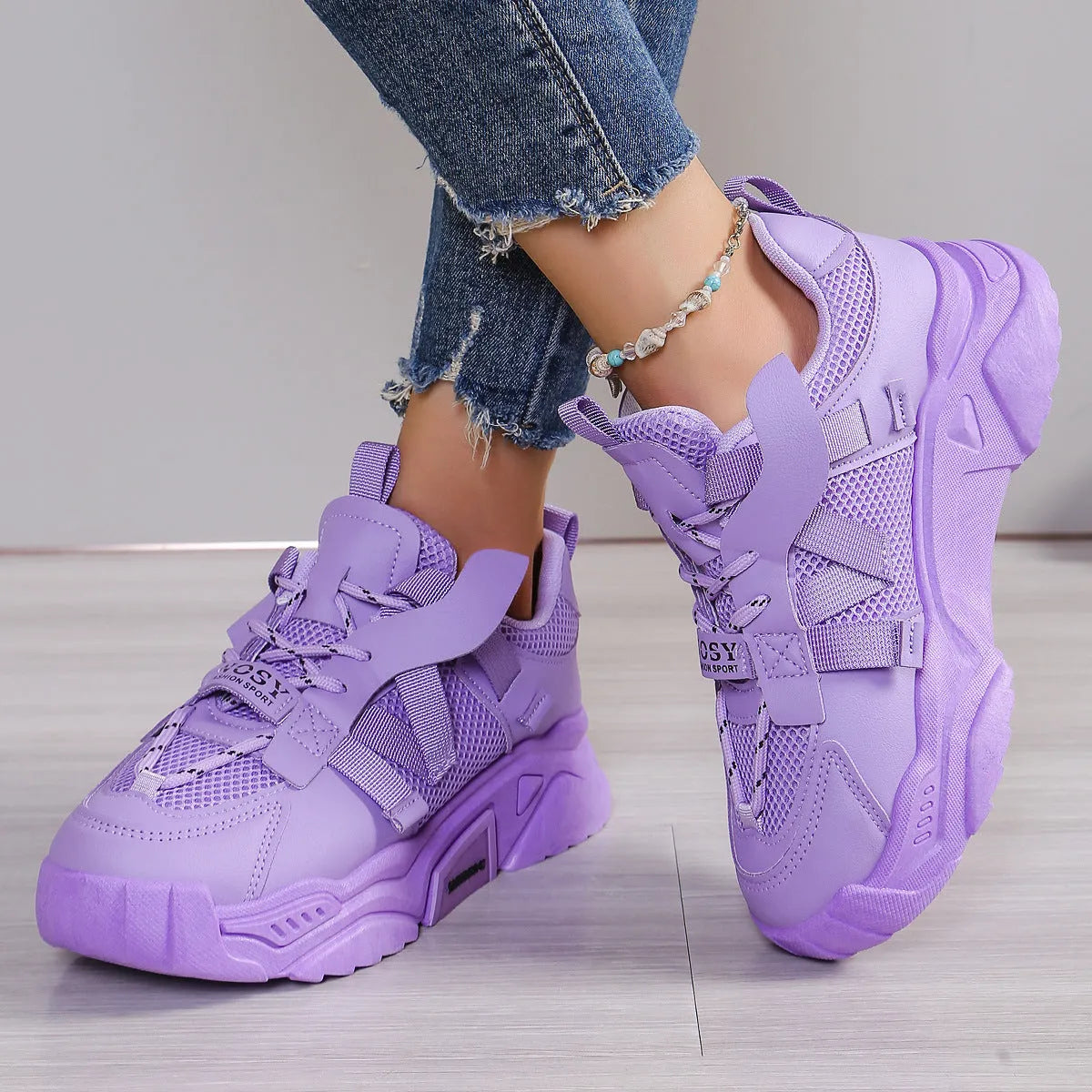 Women's platform mesh dad sneakers in various colours on a white background.