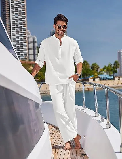 Men's casual cotton suit set in a solid colour, featuring a long-sleeved top and matching trousers.