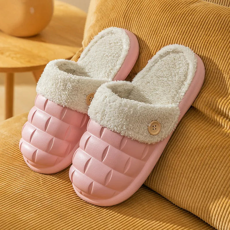 Pair of pink EVA detachable slippers with plush lining and textured anti-skid sole.