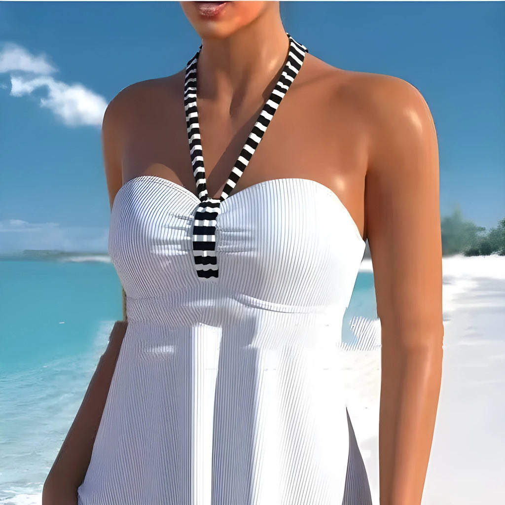 Women's off-shoulder swimsuit with solid colour body and black and white stripes in briefs style