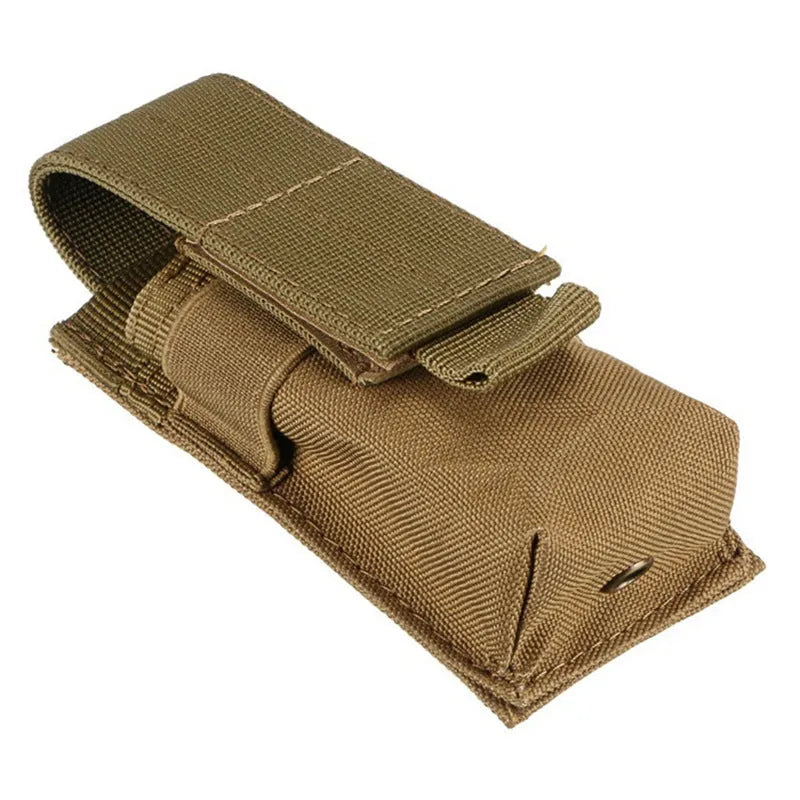 Black tactical MOLLE pistol magazine pouch with elastic cord closure, shown on a vest.