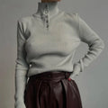 Slim fit half turtleneck pullover sweater in core-spun yarn fabric with single-breasted placket