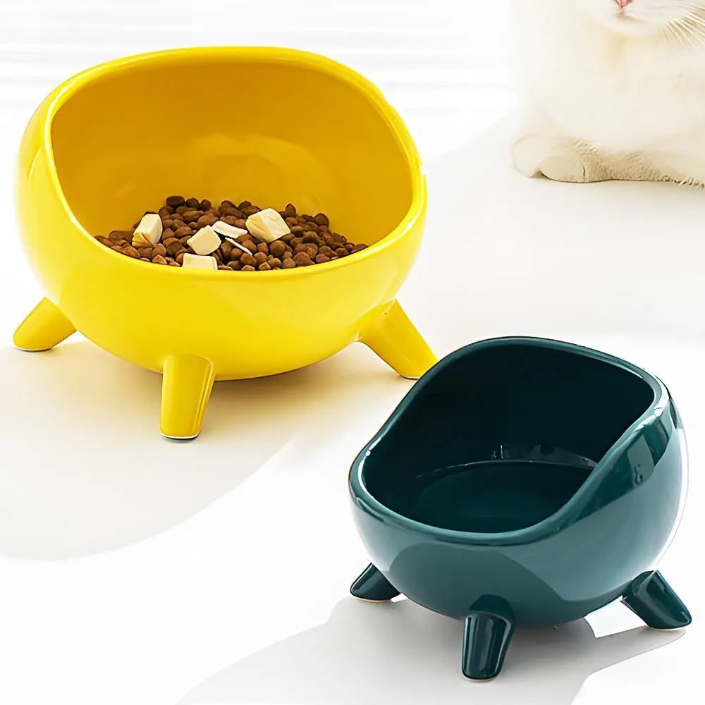Green ceramic pet food bowl with four-legged stability design for cats and small dogs