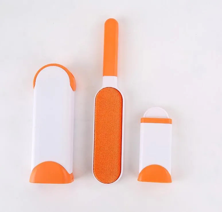 Blue reusable pet hair removal brush with self-cleaning base for sofas and upholstery.