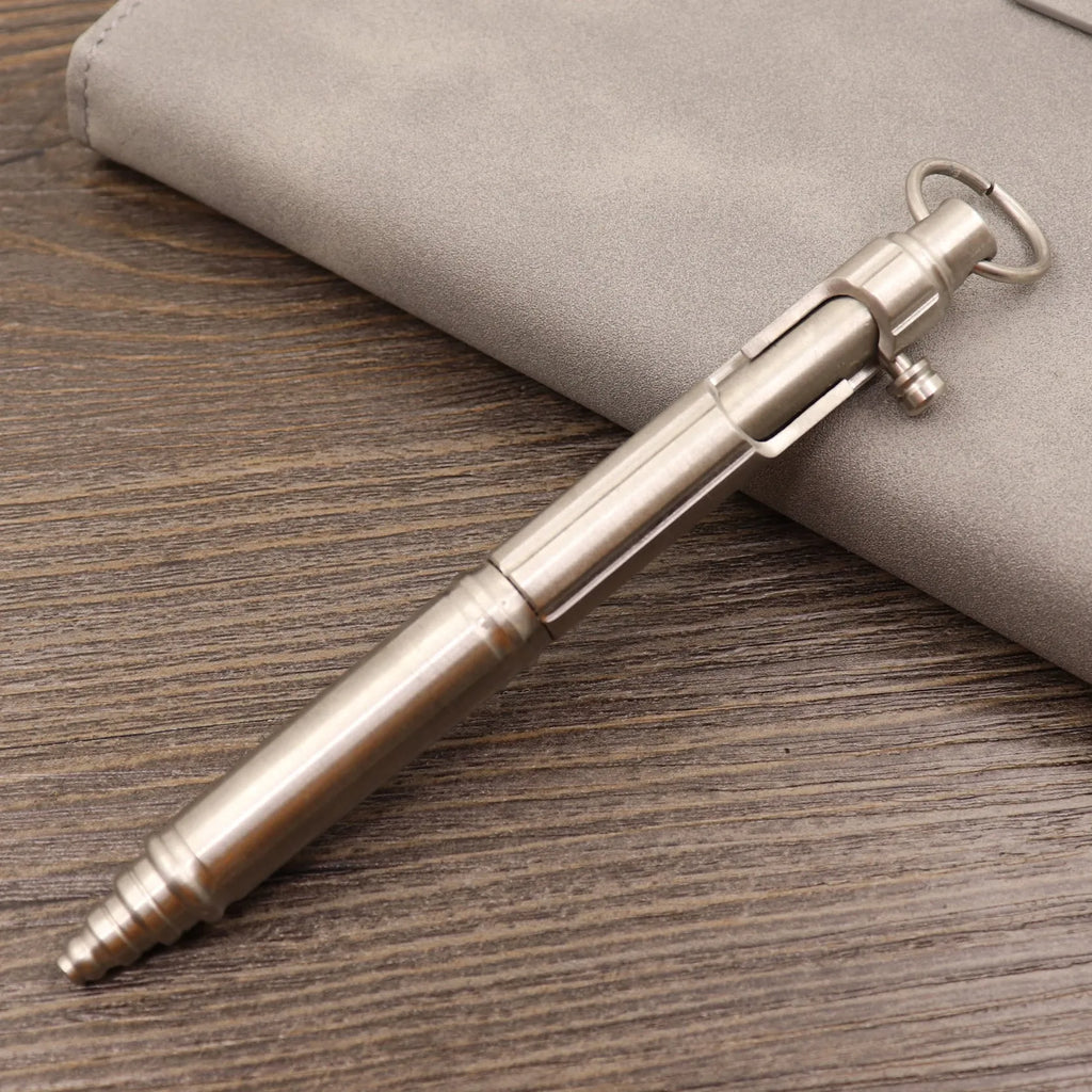 Retro brass tactical pen with bolt action mechanism in brushed natural finish
