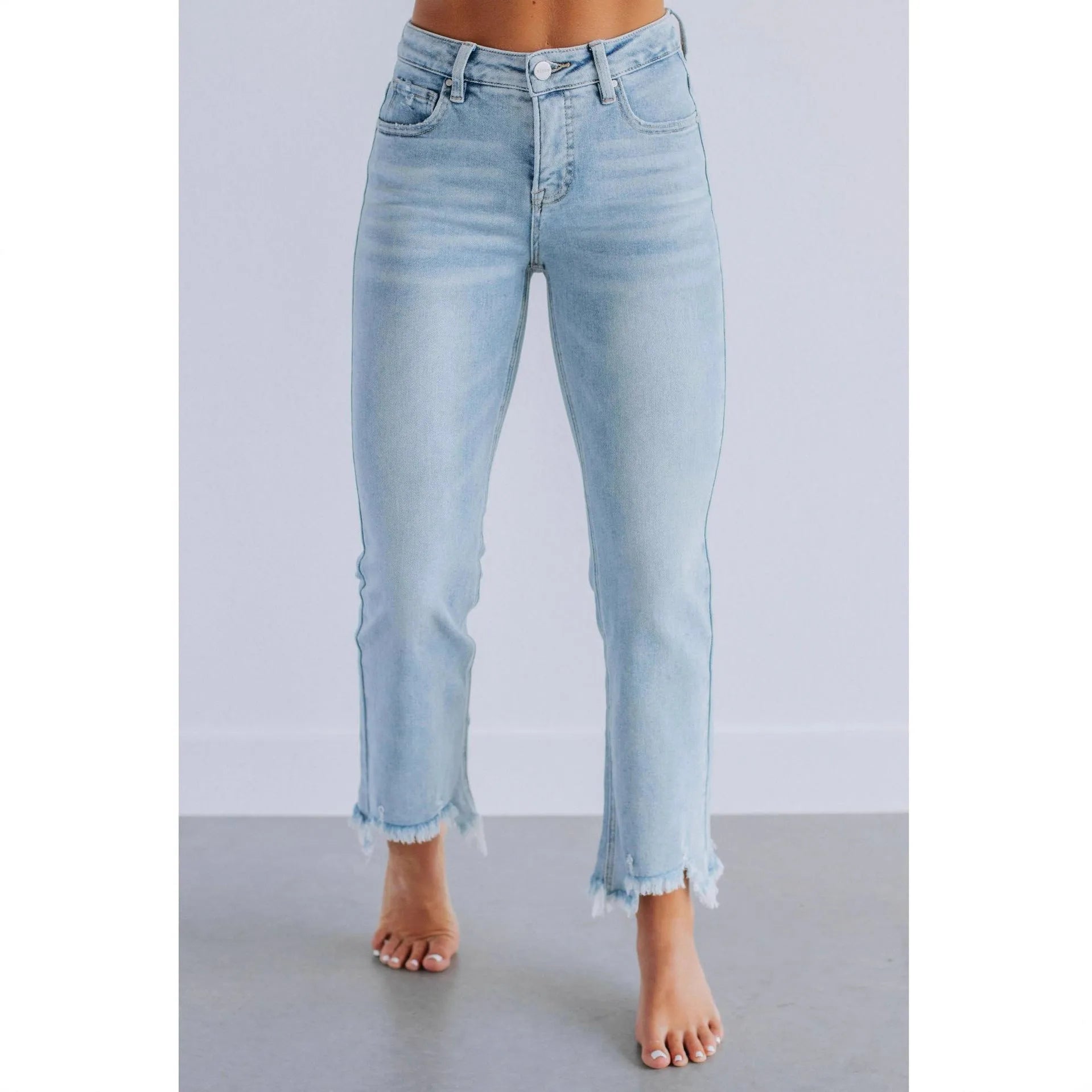 Women's solid colour denim jeans with hand-worn detailing in dark blue and light blue options