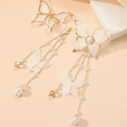 White butterfly earrings with tassel lace, pearl and rhinestone decorations on copper alloy