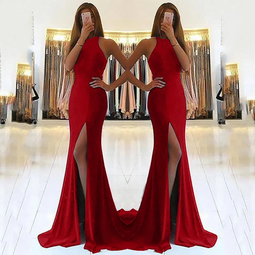 Long red knitted evening dress with high waist, swing skirt, hollow details and zipper.