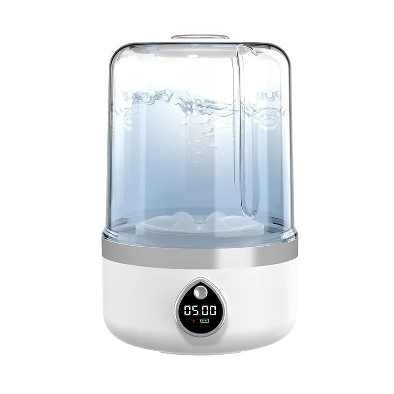 White portable mini washing machine with USB cable on a countertop
