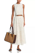 White women's sleeveless suit with embroidered long skirt in retro art style