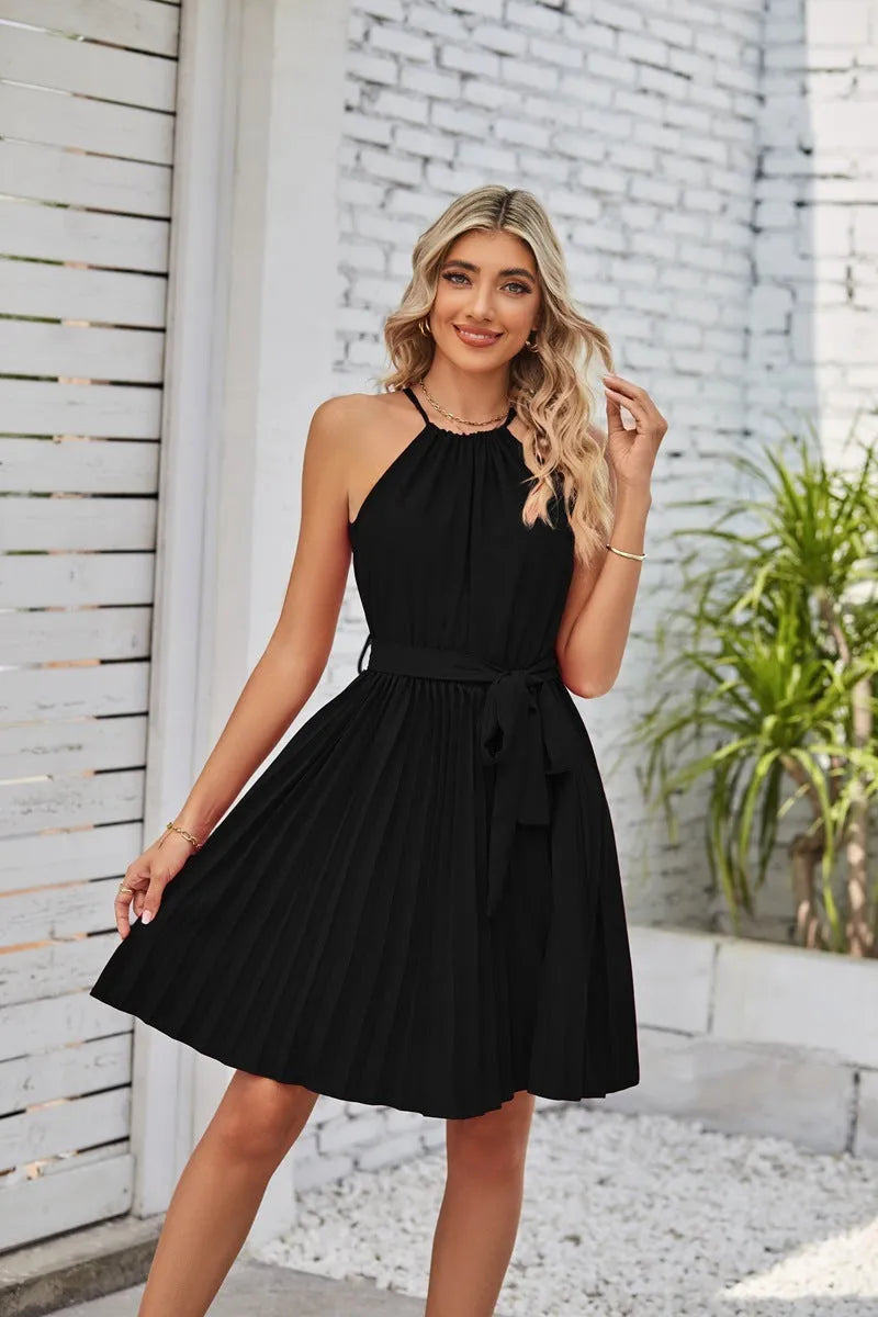 Women's black halter-neck strapless chiffon dress with pleated midi skirt and adjustable waist belt