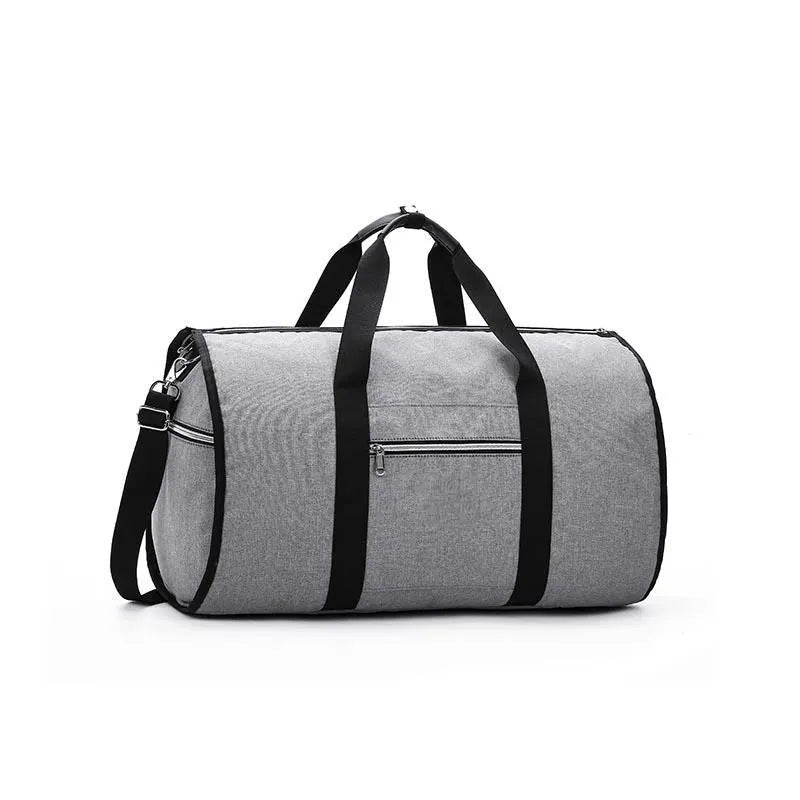 Medium-sized cylinder travel bag in Oxford cloth, shown in one of four colours: black, blue, light grey or red.