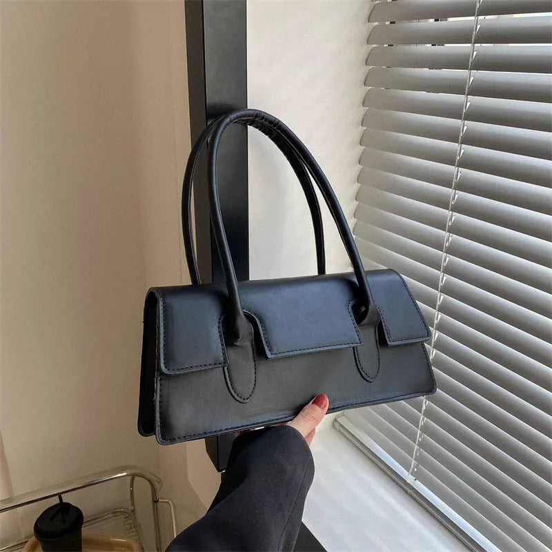 Women's black PU leather square shoulder bag with single strap and stitching detail