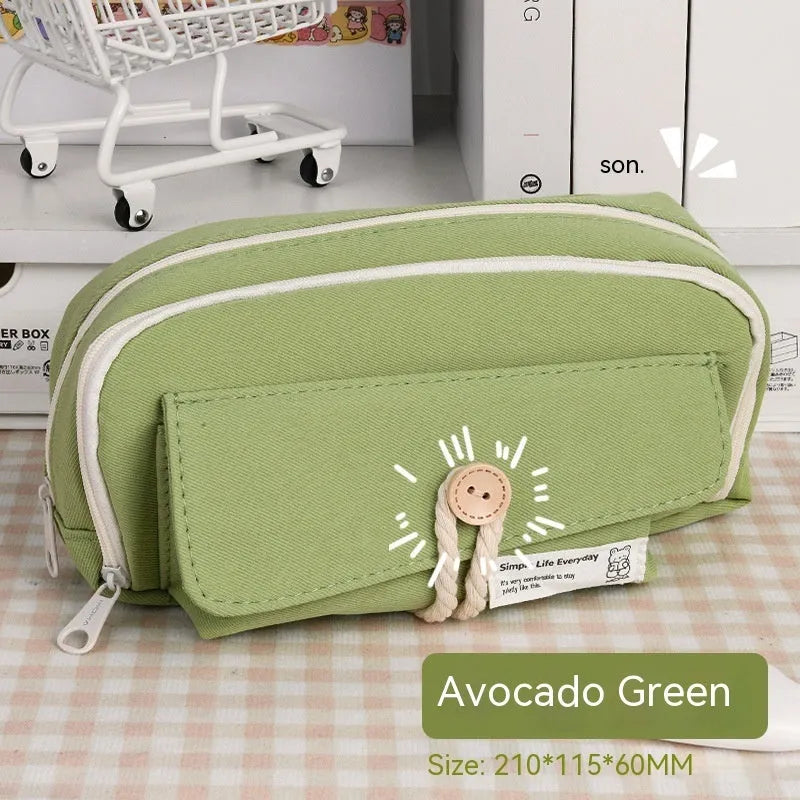 Korean style canvas pencil case in green colour showing large capacity for multiple pens