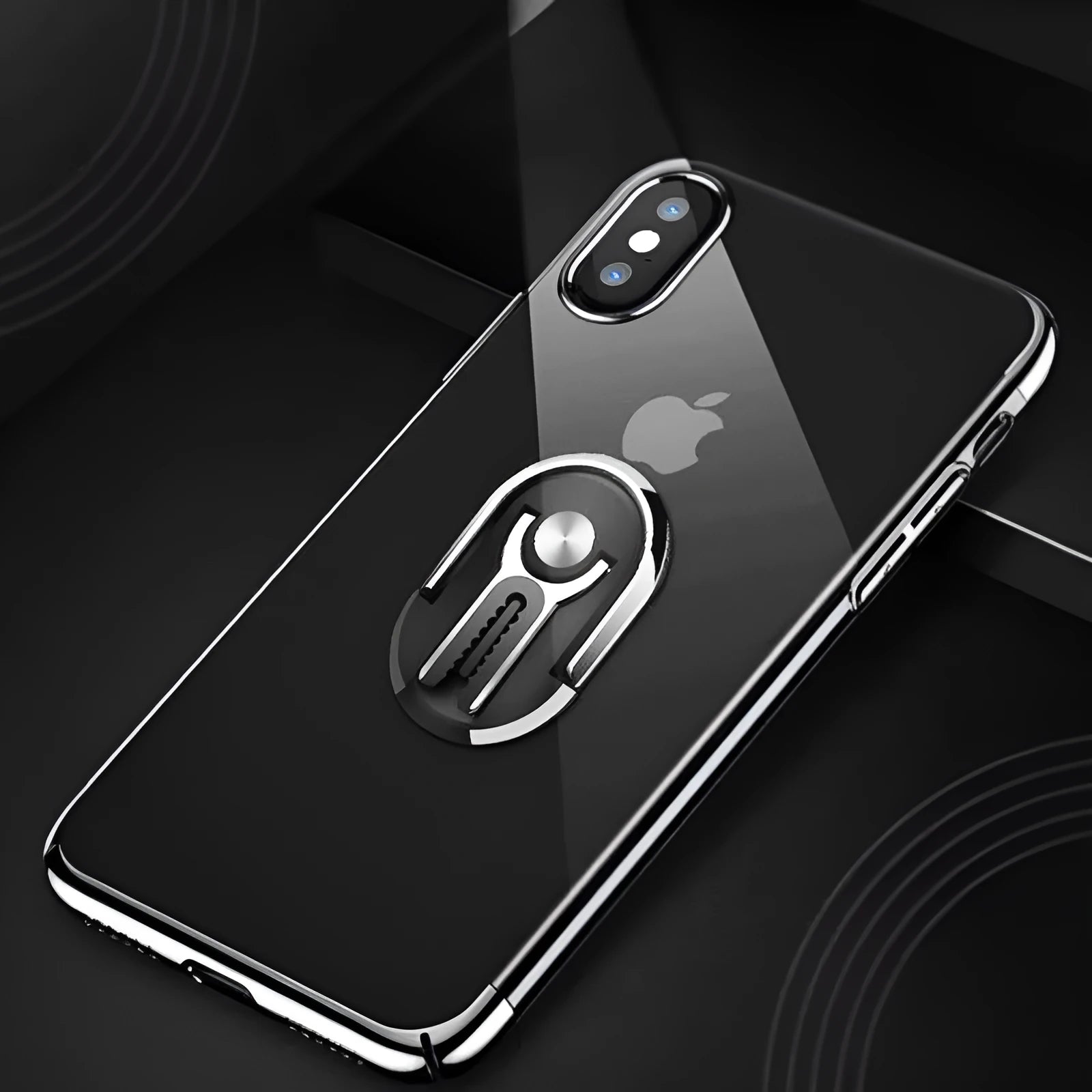Black universal car phone bracket mounted on car vent holding smartphone