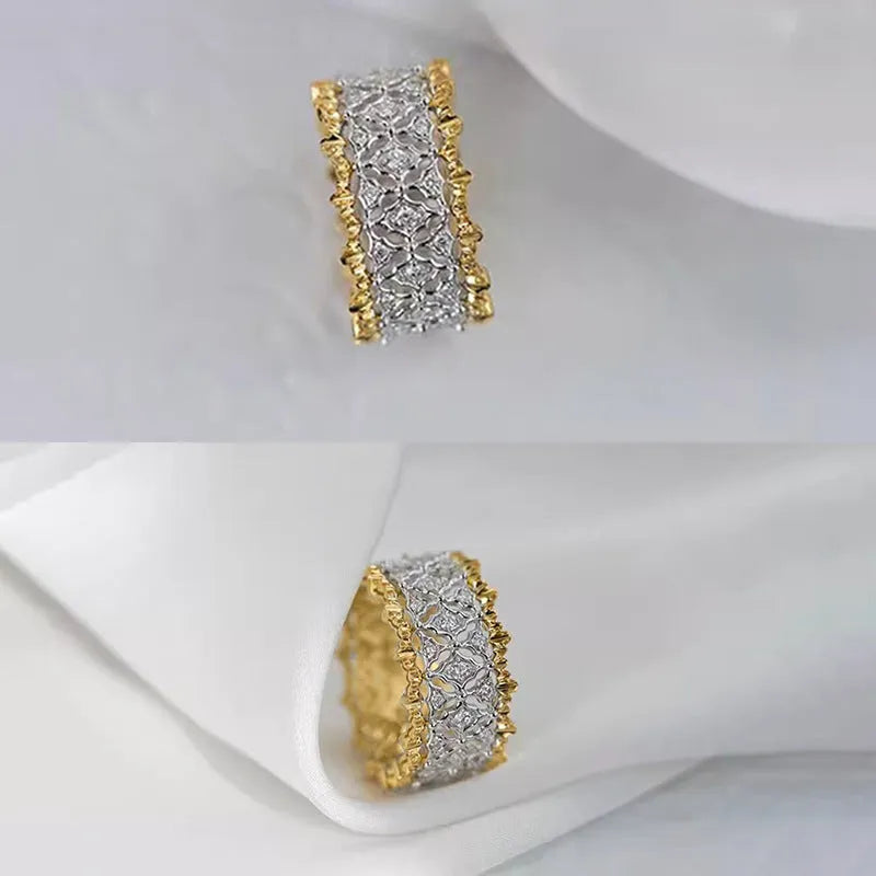 Geometric round two-tone zircon ring in gold colour on a copper base.
