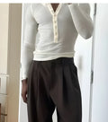 Men's cream-coloured ribbed long-sleeve henley top with a three-button placket