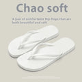 Foldable flat slippers with hollow-out plastic uppers and non-slip PVC soles in orange, purple, black, or white.