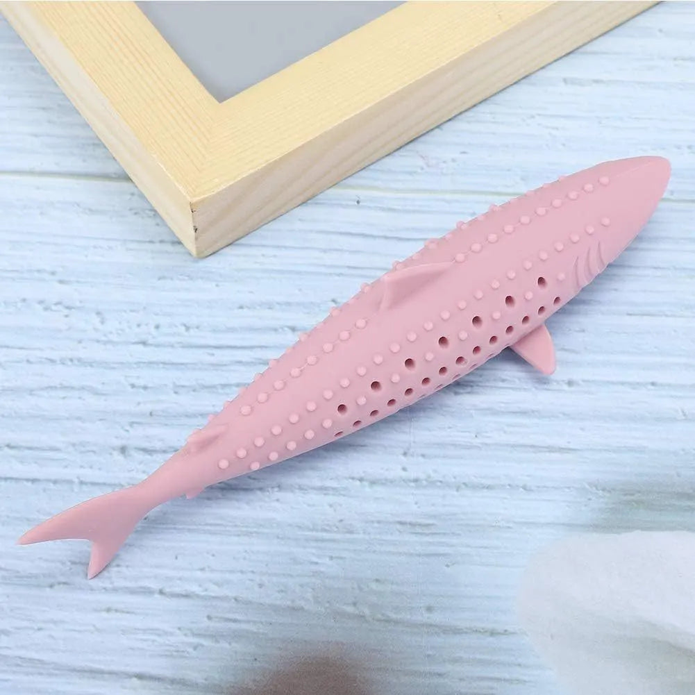 Green silicone fish-shaped chew toy for cats on a white background, showing side breathable holes.