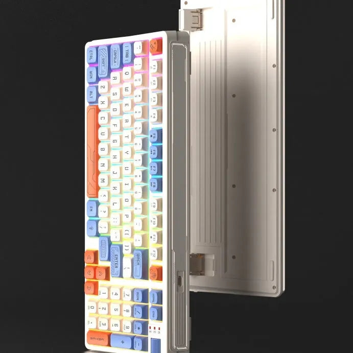 Three-colour luminous mechanical-feel USB keyboard in desktop setup showing backlighting
