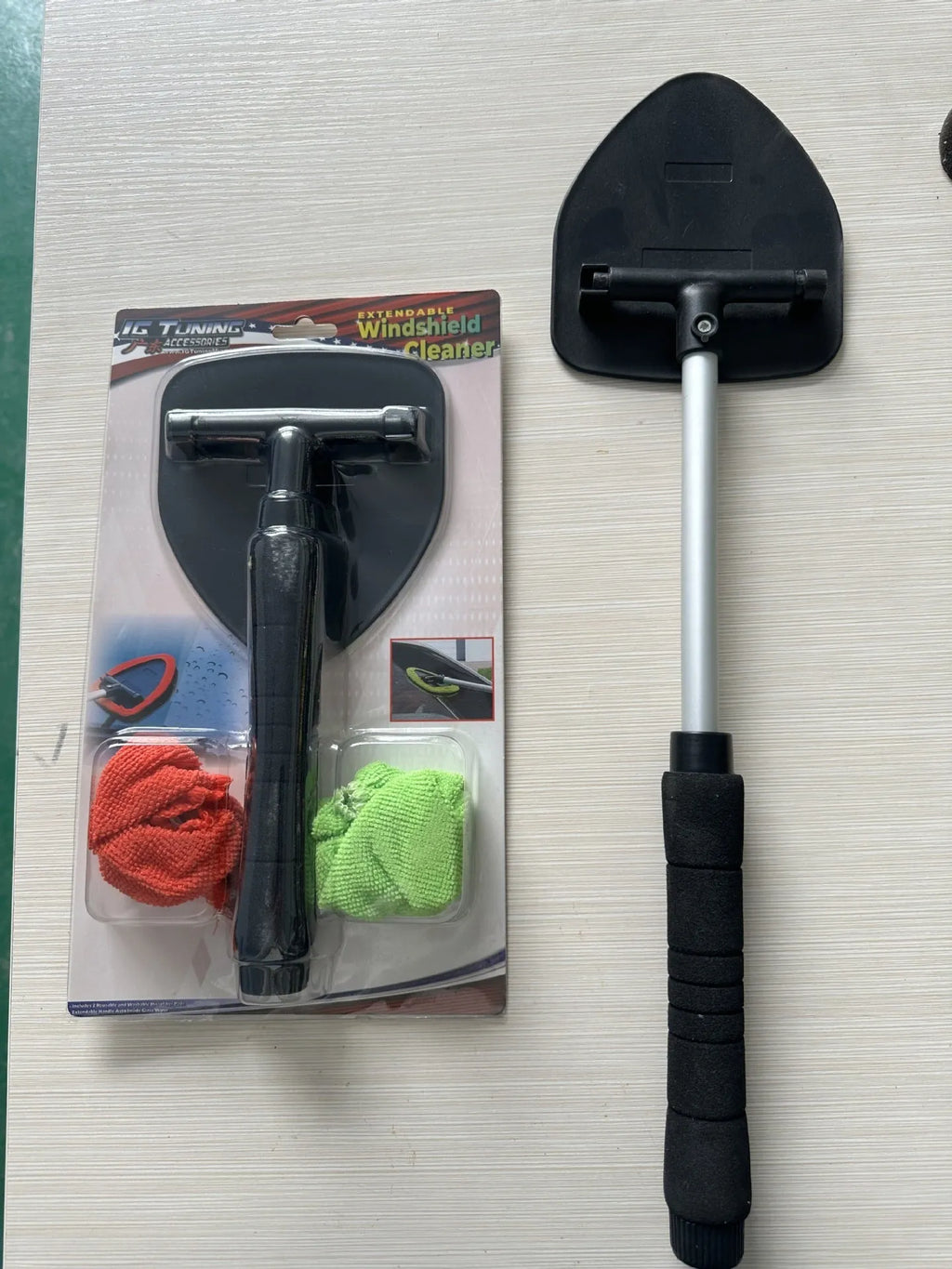 Car windshield and window cleaning brush in plastic construction with colour options of red, green or sapphire blue