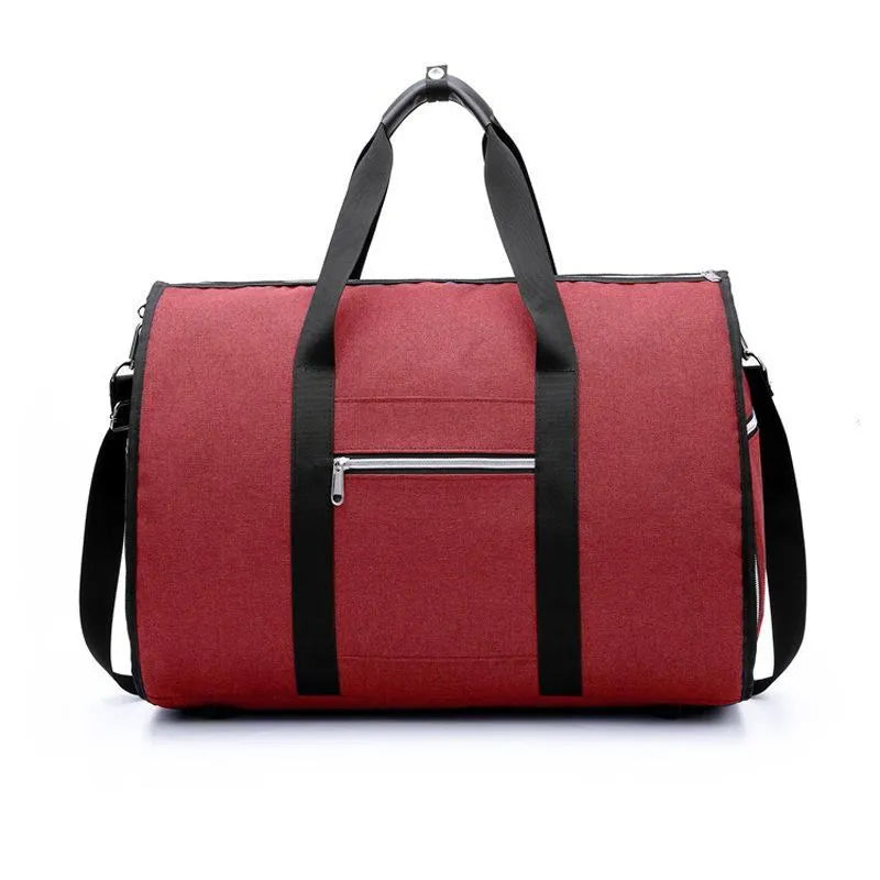 Medium-sized cylinder travel bag in Oxford cloth, shown in one of four colours: black, blue, light grey or red.