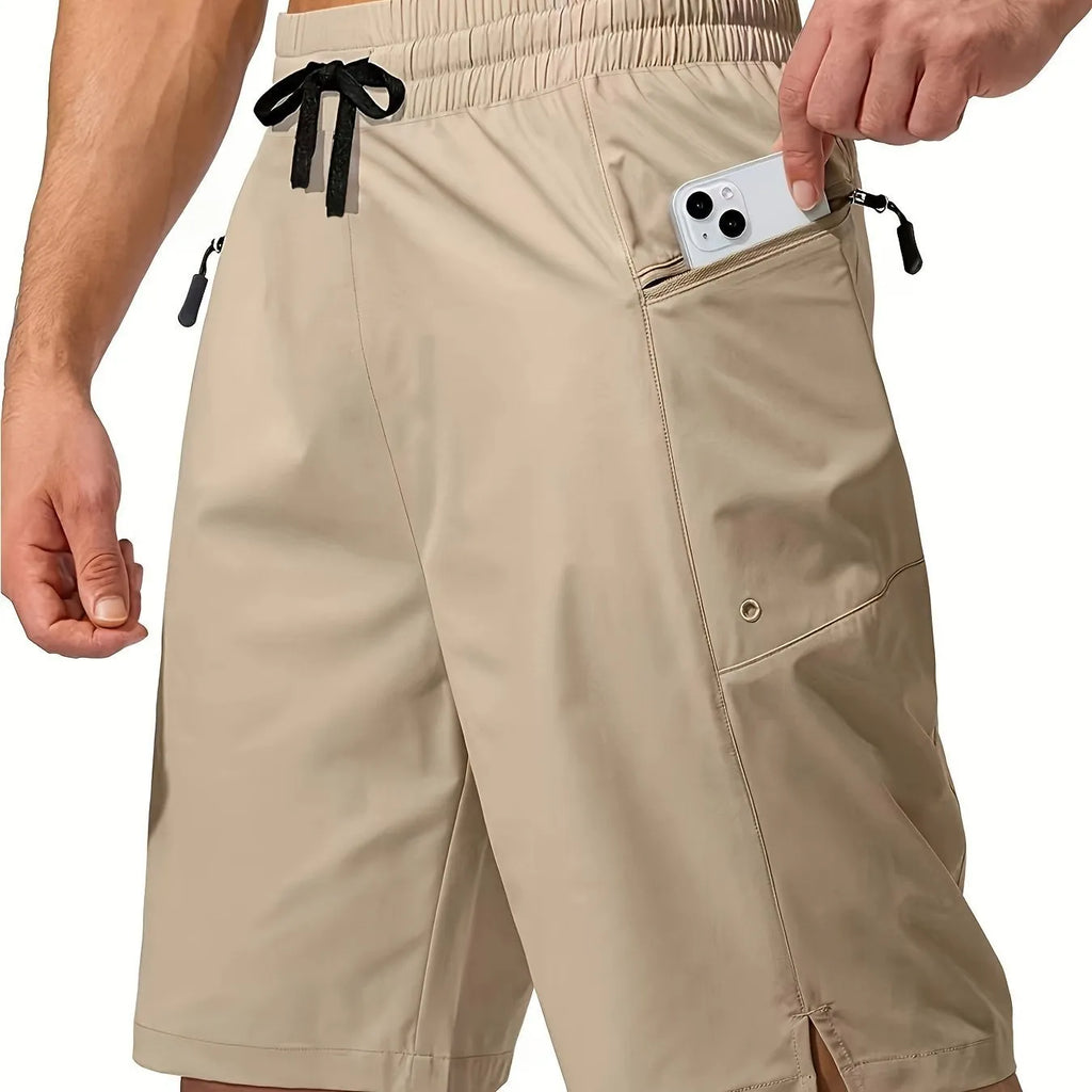 Men's solid colour quick-drying beach shorts in polyester fabric showing straight-leg cut
