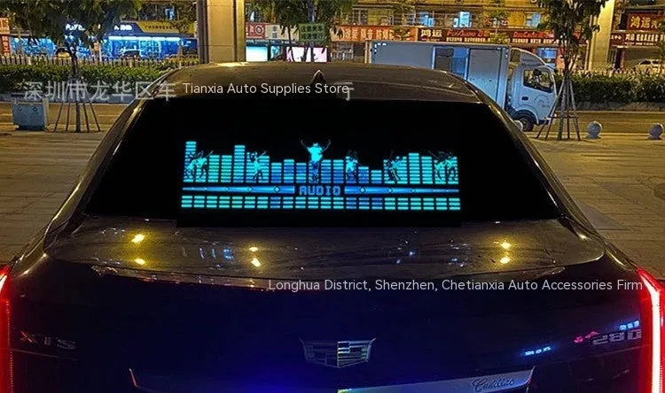 Car interior voice-controlled rhythm light displaying one of its 16 electroluminescent patterns on a 90 by 25 cm panel.
