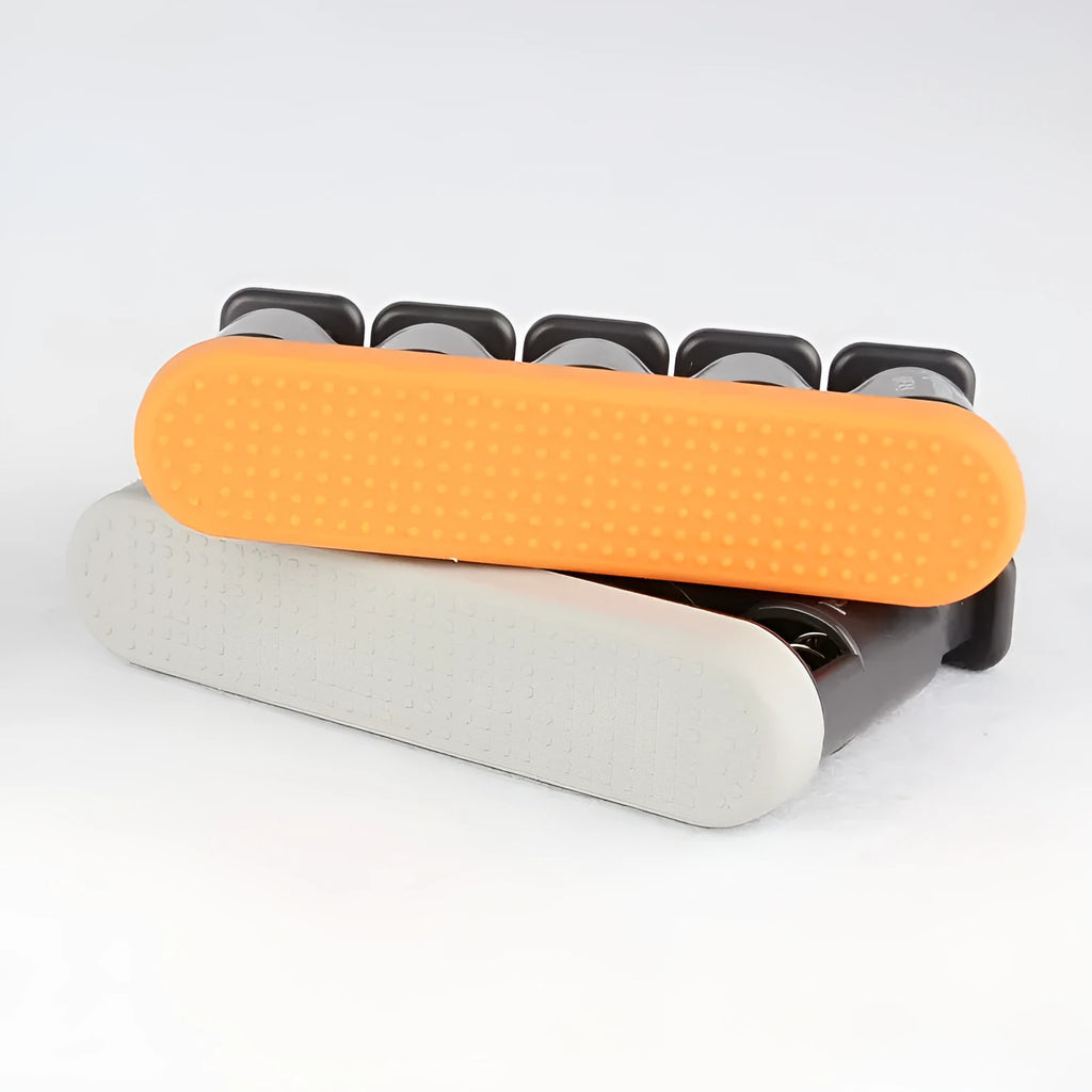Grey and orange non-slip silicone finger trainer for musical hand development