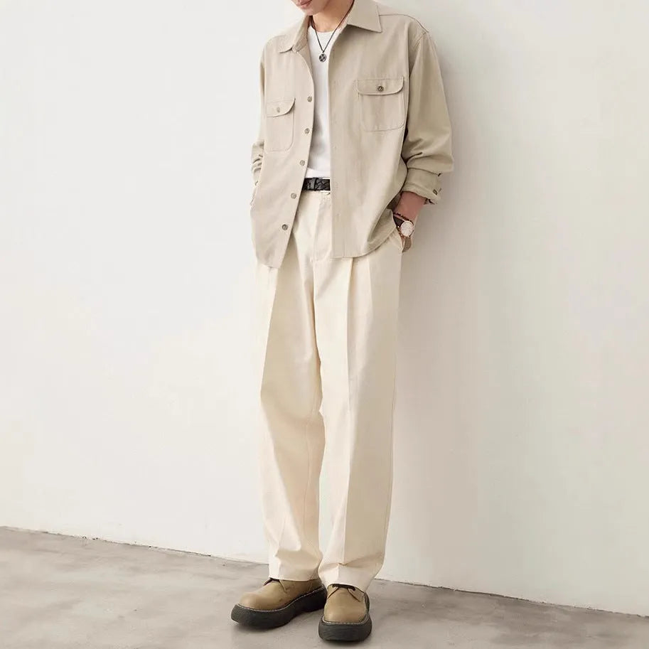 Men's light sand rice colour casual long sleeve shirt with a simple lapel, on a hanger.