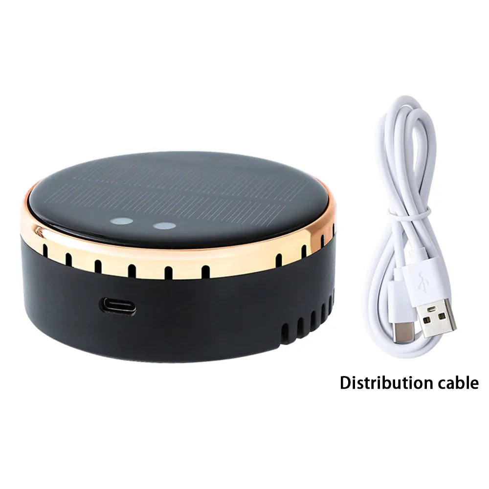 Black solar-powered car air humidifier mounted in a vehicle air conditioning vent