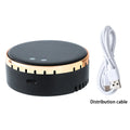 Black solar-powered car air humidifier mounted in a vehicle air conditioning vent