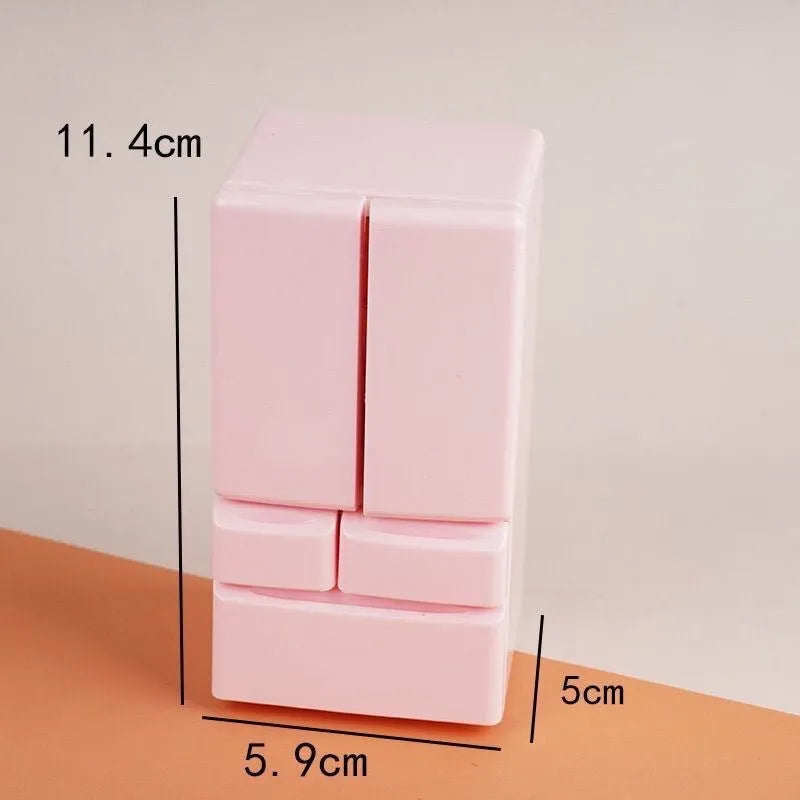 White plastic miniature candy toy model with lighting feature showing detailed candy design