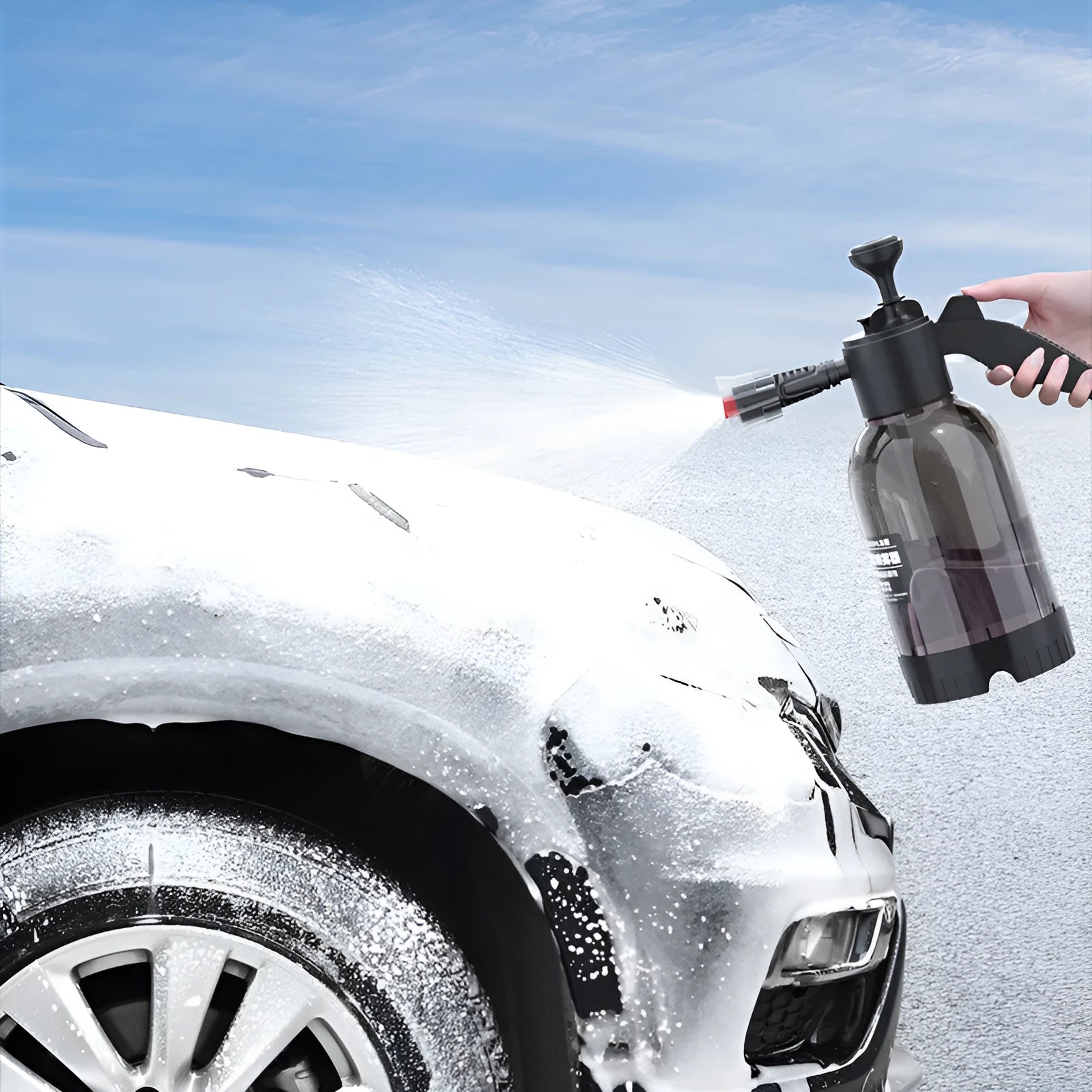 Black hand-held sprayer bottle with ergonomic handle and two nozzles for garden watering and car washing