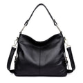 Genuine leather women's crossbody bag in square vertical design, showing internal zipped phone and document pockets.
