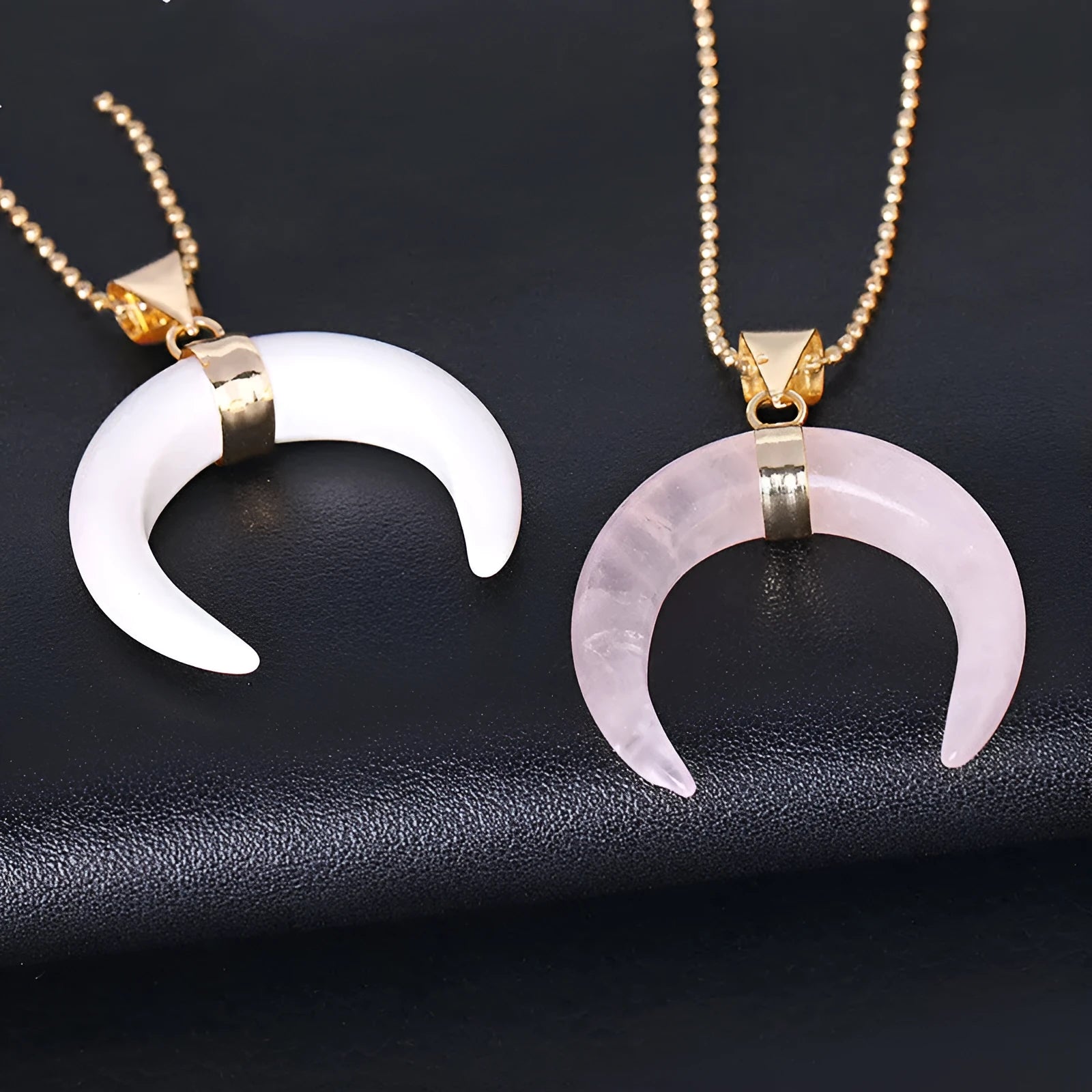 Natural semi-precious stone moon pendant necklace on a 45cm copper chain, shown in pink and purple colour options.