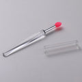 Silicone lip brush with protective cap for hygienic lip product application