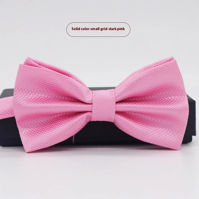 Men's flat head solid colour bow tie in polyester, showing 12cm by 6cm size on a background.