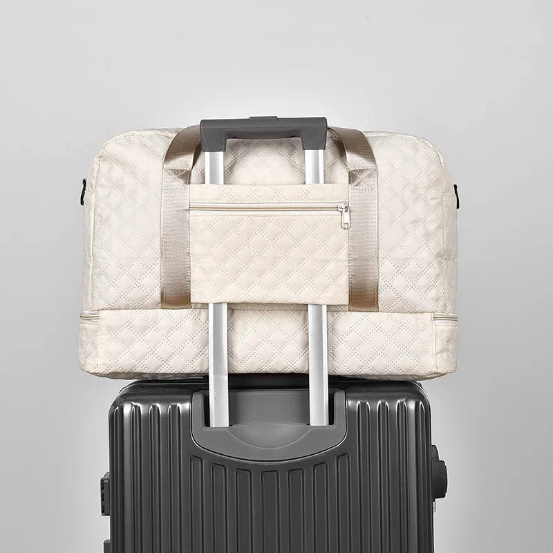 Large Oxford cloth leisure travel bag in a solid colour with sewing thread detail, shown in a 36-55L capacity size.