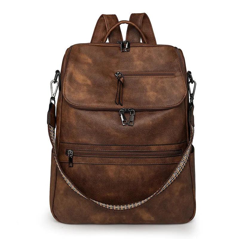 Retro college backpack with curved shoulder straps in multiple colour options including black, blue, grey, and coffee tones