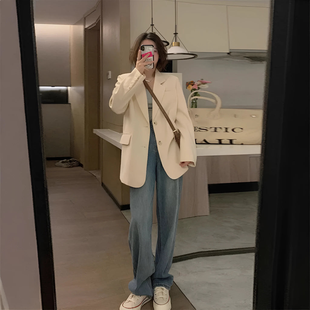 Men's solid colour Korean-style street blazer jacket on a hanger