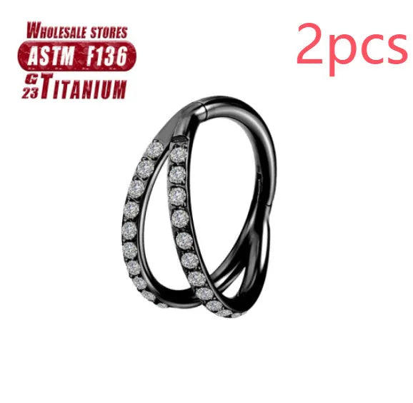 Close-up of a titanium alloy fork nose ring in silver, showing the two-prong design on a grey background.