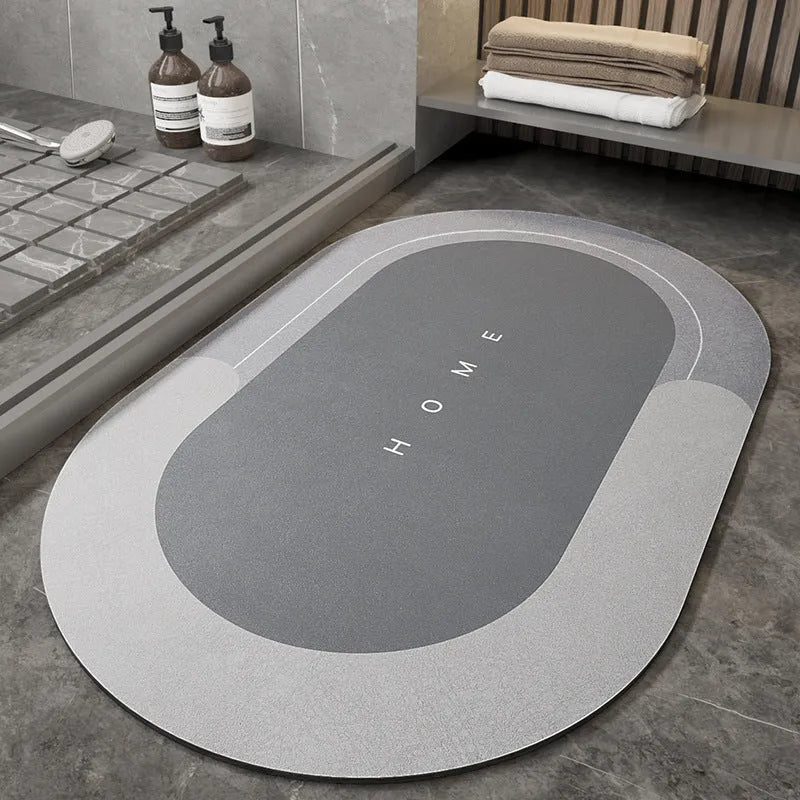 Blended fabric floor mat in an oval shape on a bathroom floor, available in multiple colours and sizes.