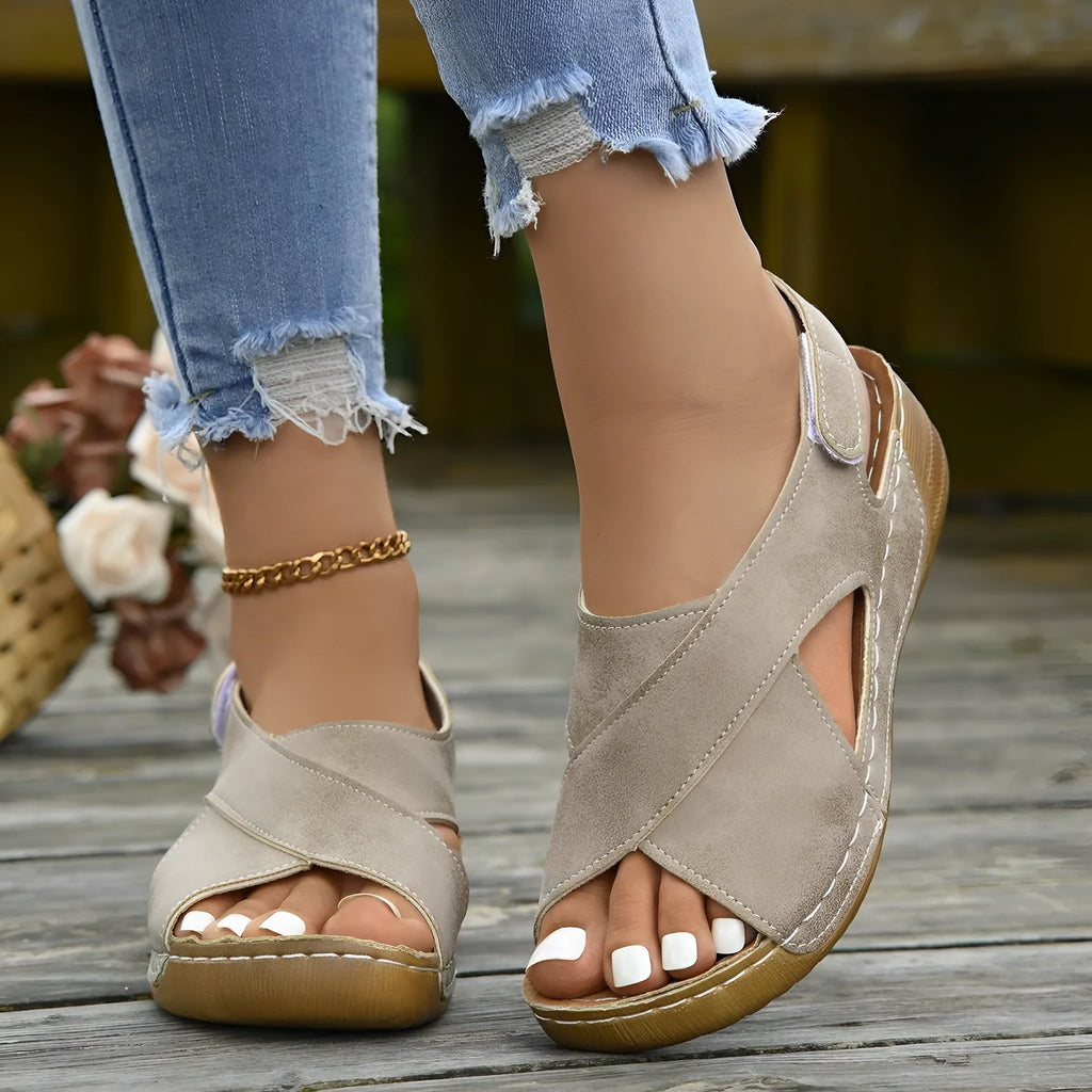 Roman-style women's platform sandals with an open toe and an adjustable Velcro ankle strap.
