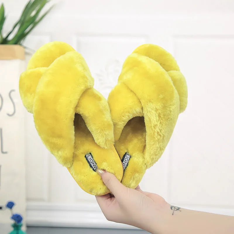 Cross open-toe fur slippers in pink with a patterned non-slip sole.